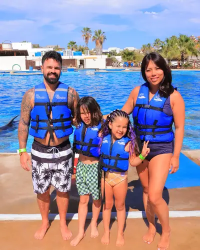 Justin and his family in life jackets